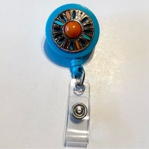 Retractable badge holder